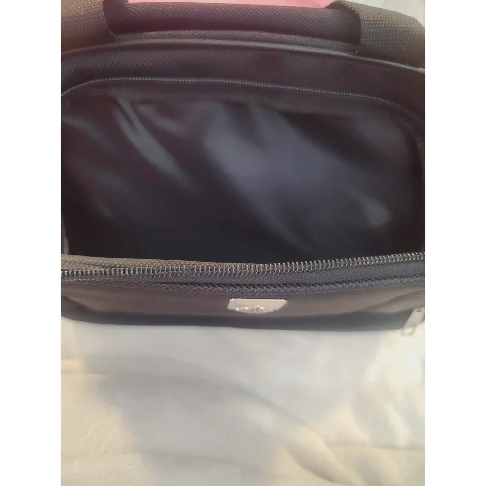Black Polyester Travel Bag Shoulder Strap Dual Handles Globe Logo Flight Plane